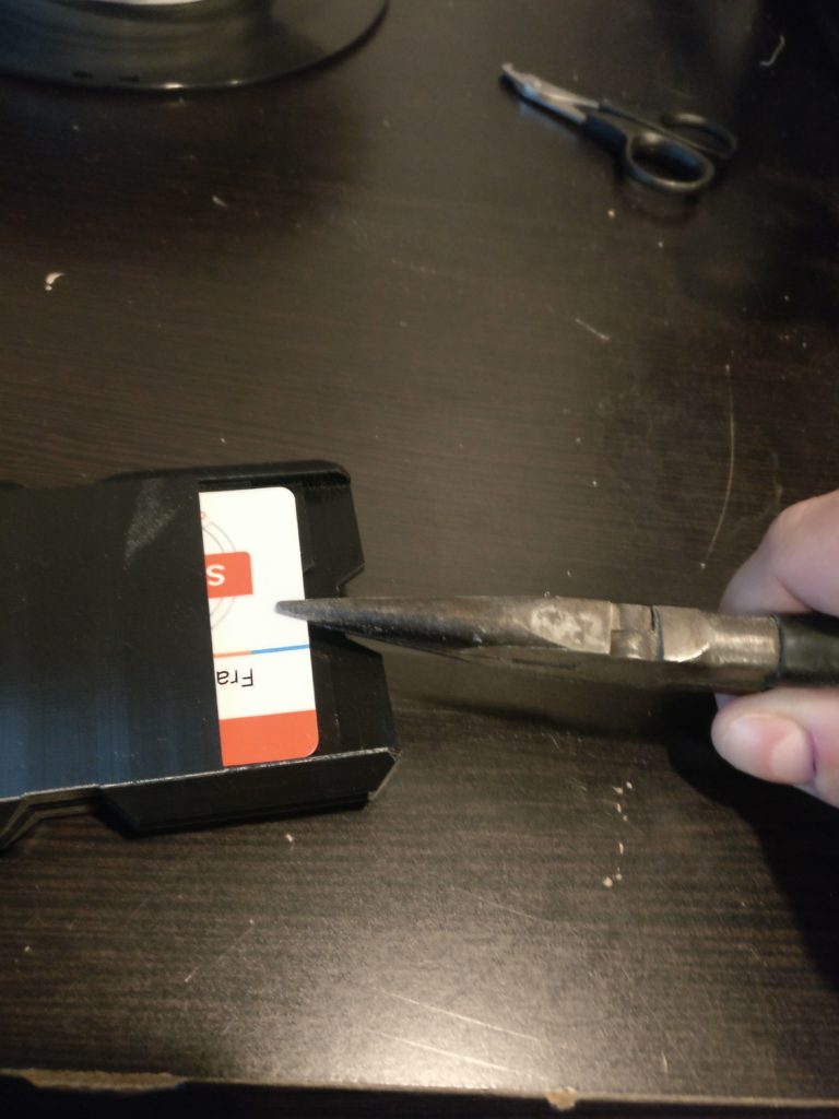 pulling card out with pliers
